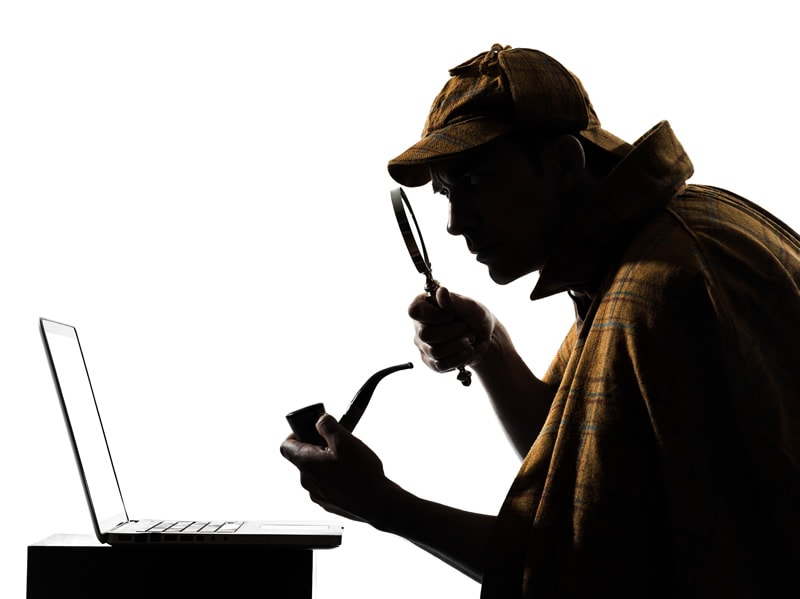 Sherlock Holmes At Laptop